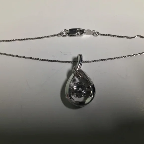 Kay Jewelers Infinity Teardrop Pendant with Free-floating Stone. - Picture 6 of 10
